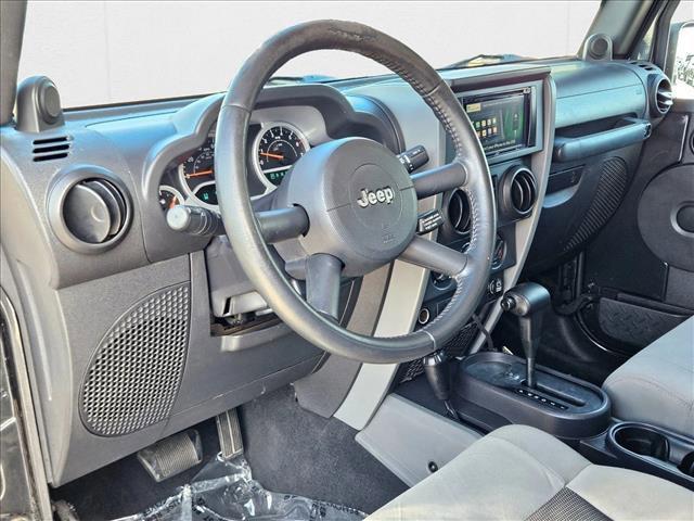 used 2010 Jeep Wrangler Unlimited car, priced at $13,991
