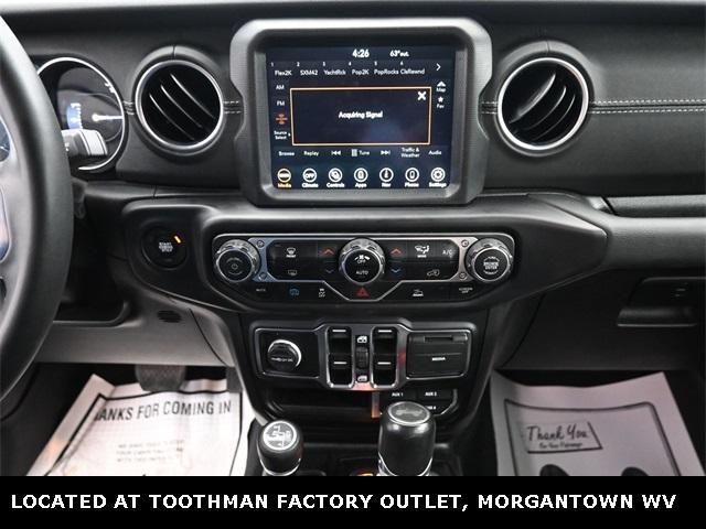 used 2023 Jeep Wrangler 4xe car, priced at $29,982