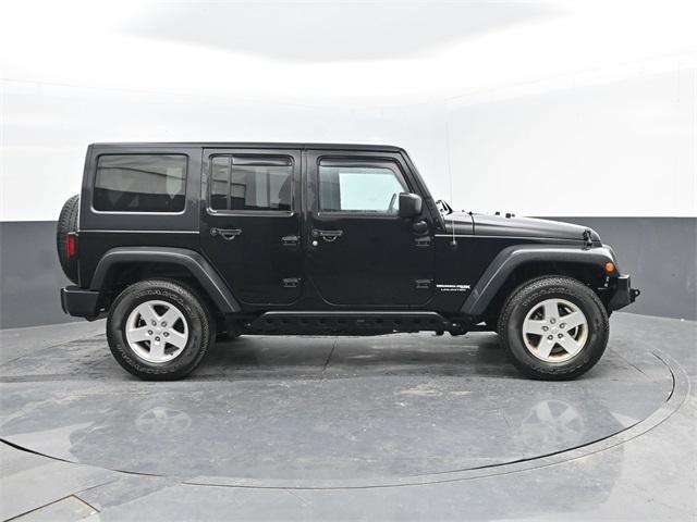 used 2018 Jeep Wrangler JK Unlimited car, priced at $21,888
