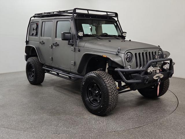 used 2014 Jeep Wrangler Unlimited car, priced at $20,943