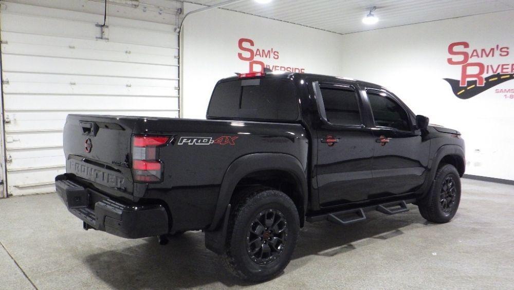 used 2024 Nissan Frontier car, priced at $31,900