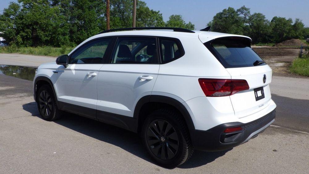 used 2023 Volkswagen Taos car, priced at $16,900