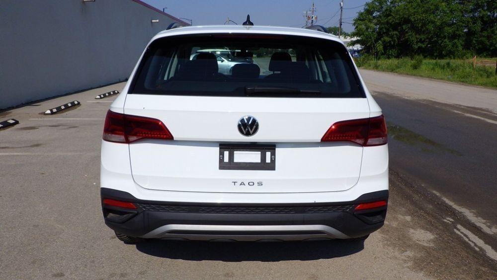 used 2023 Volkswagen Taos car, priced at $16,900