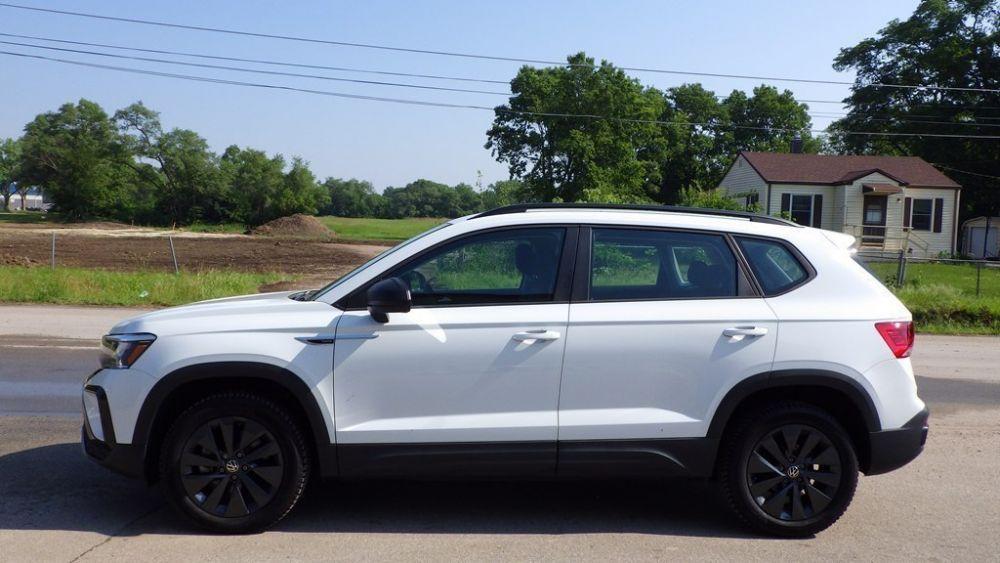 used 2023 Volkswagen Taos car, priced at $16,900