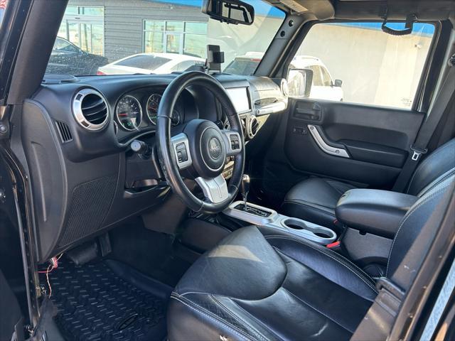 used 2015 Jeep Wrangler Unlimited car, priced at $16,995