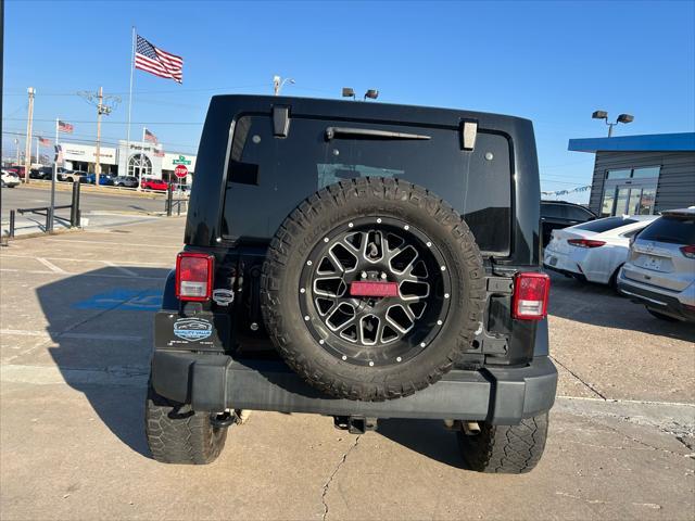 used 2015 Jeep Wrangler Unlimited car, priced at $16,995