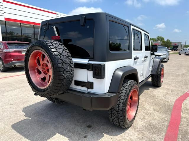 used 2016 Jeep Wrangler Unlimited car, priced at $19,988