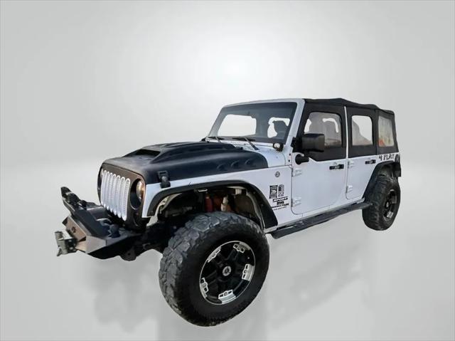 used 2018 Jeep Wrangler JK Unlimited car, priced at $19,442