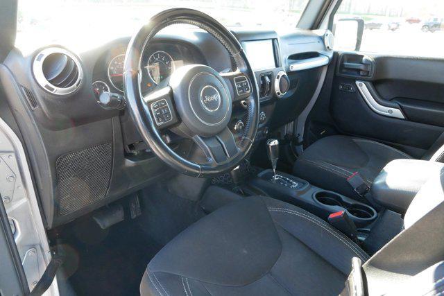 used 2015 Jeep Wrangler Unlimited car, priced at $17,289