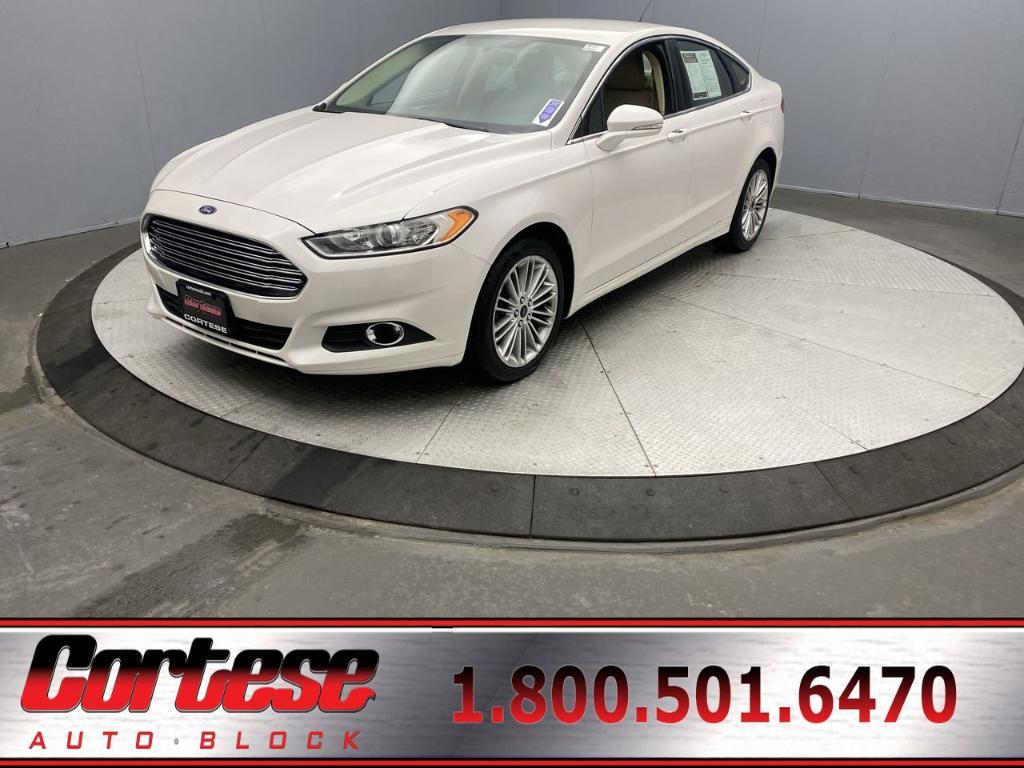 used 2016 Ford Fusion car, priced at $10,888