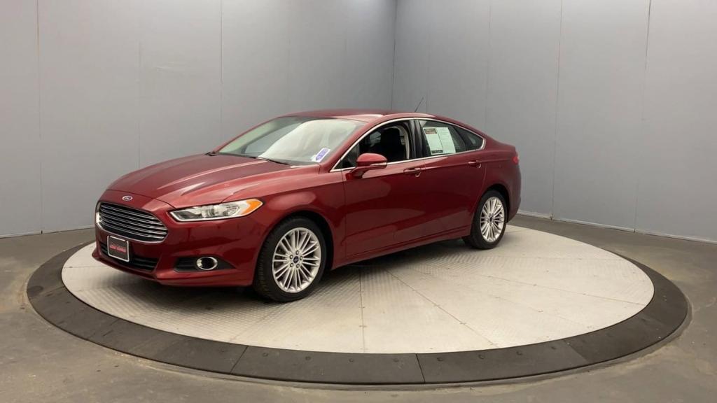 used 2016 Ford Fusion car, priced at $16,995