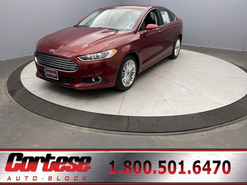 used 2016 Ford Fusion car, priced at $16,995