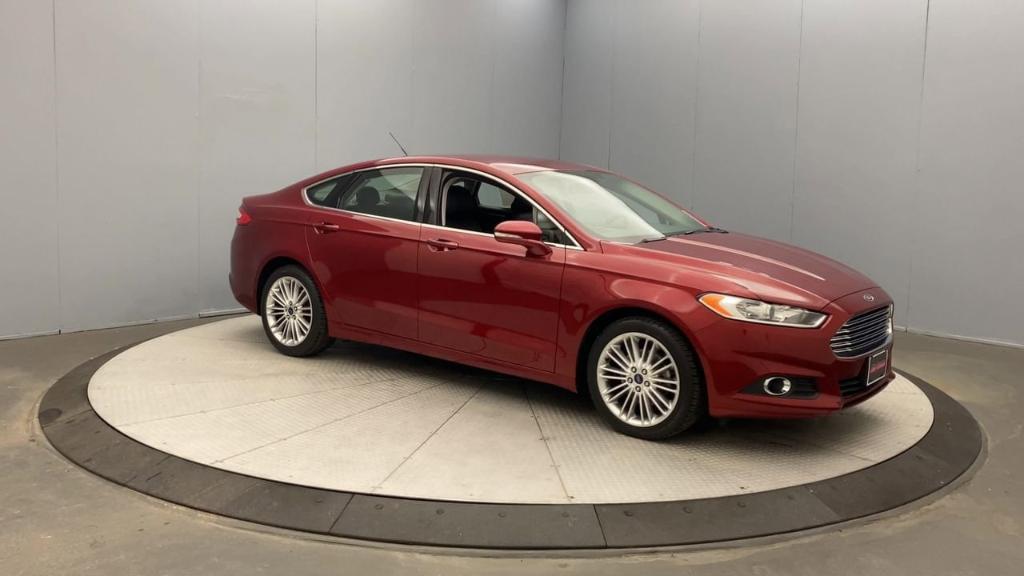 used 2016 Ford Fusion car, priced at $16,995