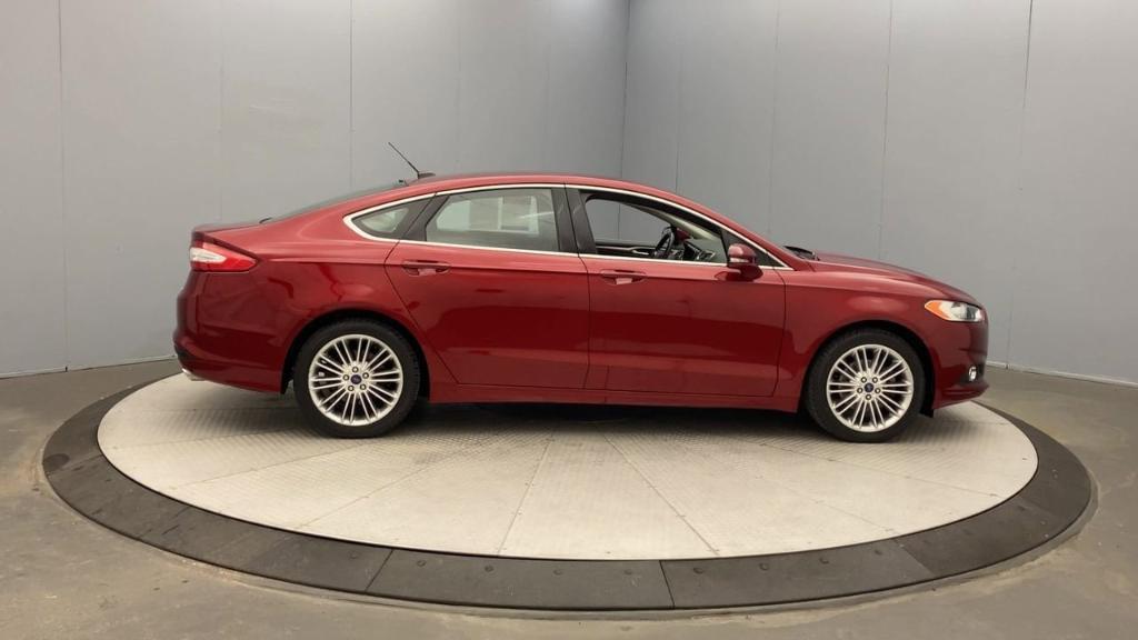 used 2016 Ford Fusion car, priced at $16,995