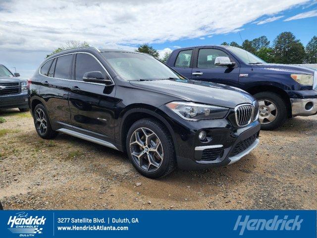 used 2018 BMW X1 car, priced at $23,900