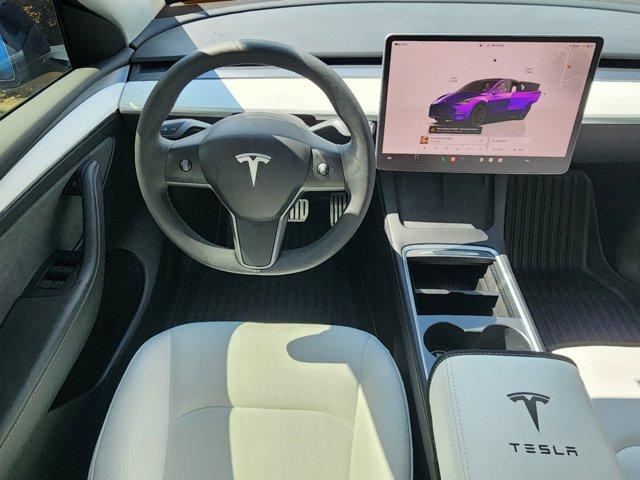 used 2024 Tesla Model Y car, priced at $42,695