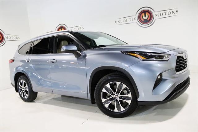 used 2021 Toyota Highlander Hybrid car, priced at $29,333