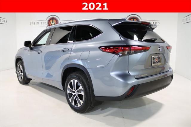 used 2021 Toyota Highlander Hybrid car, priced at $29,333