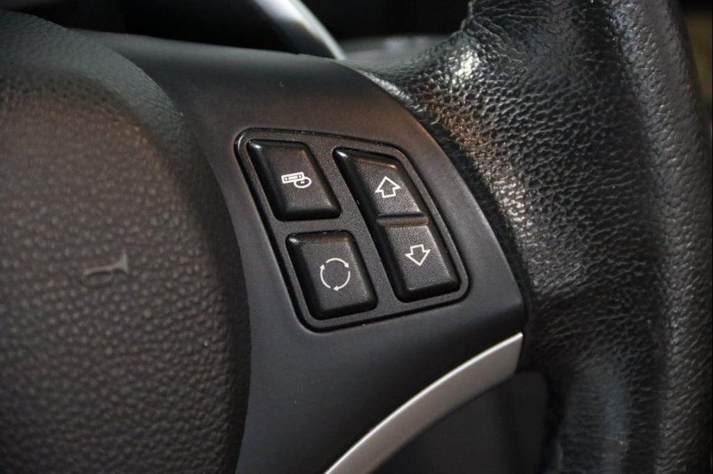 used 2012 BMW 135 car, priced at $11,690