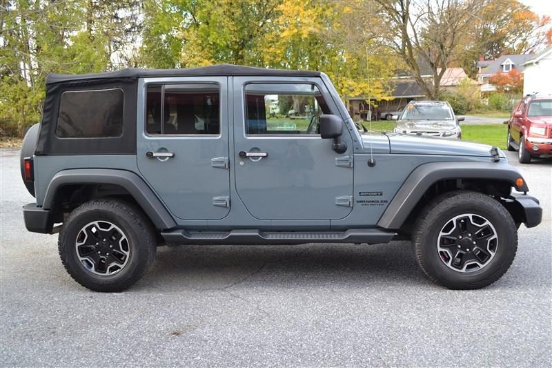 used 2014 Jeep Wrangler Unlimited car, priced at $17,999