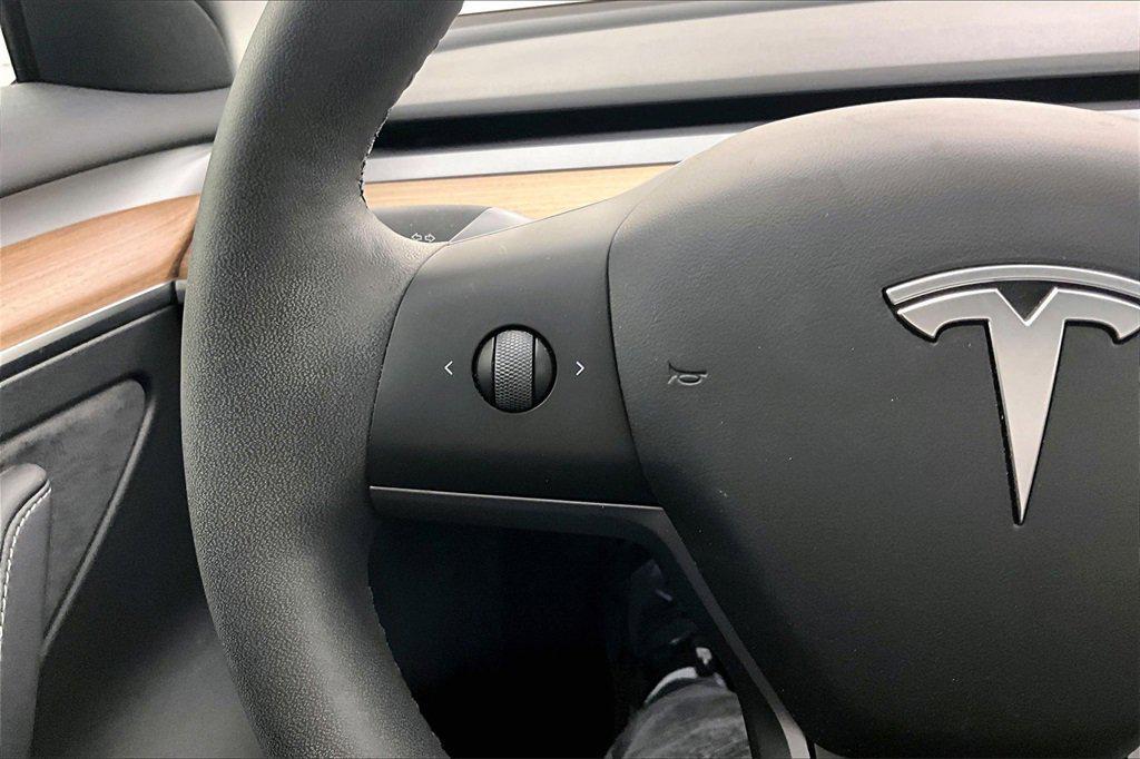 used 2023 Tesla Model 3 car, priced at $34,995