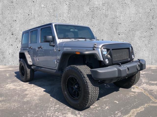 used 2016 Jeep Wrangler Unlimited car, priced at $22,995