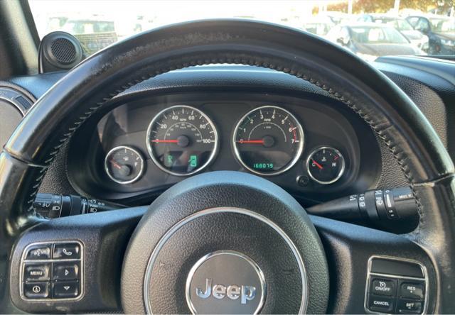 used 2011 Jeep Wrangler Unlimited car, priced at $10,995