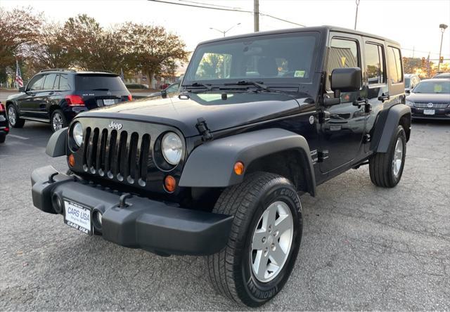 used 2011 Jeep Wrangler Unlimited car, priced at $10,995