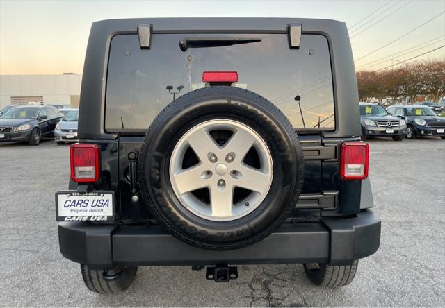 used 2011 Jeep Wrangler Unlimited car, priced at $10,995