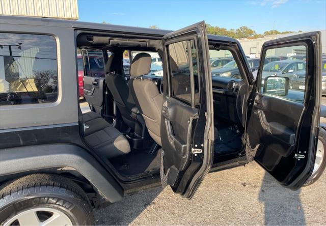 used 2011 Jeep Wrangler Unlimited car, priced at $10,995