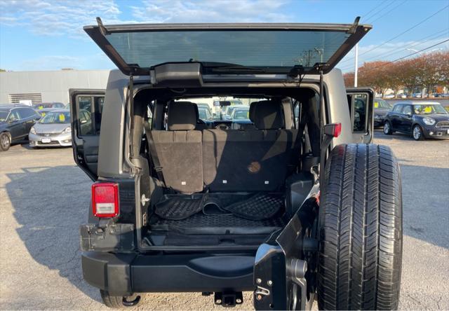 used 2011 Jeep Wrangler Unlimited car, priced at $10,995