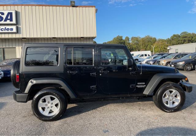 used 2011 Jeep Wrangler Unlimited car, priced at $10,995