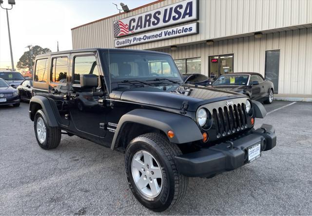 used 2011 Jeep Wrangler Unlimited car, priced at $10,995