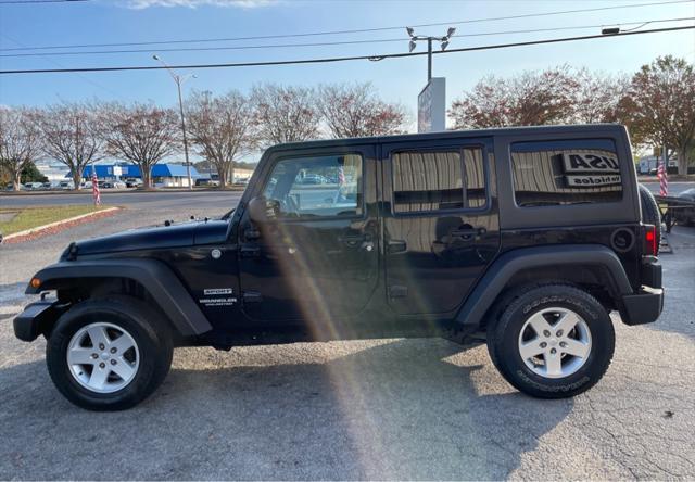 used 2011 Jeep Wrangler Unlimited car, priced at $10,995