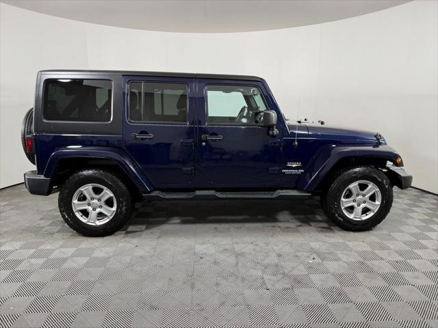 used 2013 Jeep Wrangler Unlimited car, priced at $15,615