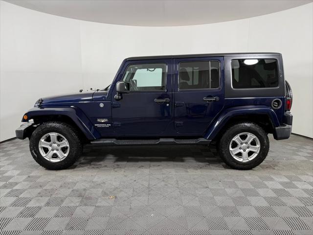 used 2013 Jeep Wrangler Unlimited car, priced at $15,615