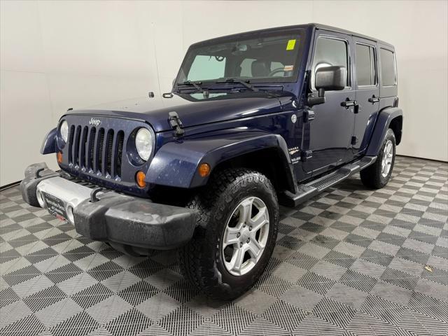 used 2013 Jeep Wrangler Unlimited car, priced at $15,615