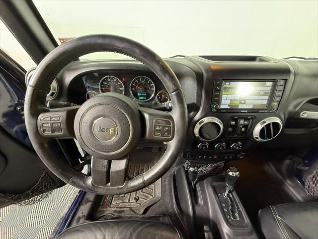 used 2013 Jeep Wrangler Unlimited car, priced at $15,615