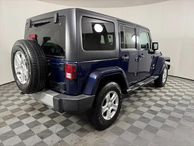 used 2013 Jeep Wrangler Unlimited car, priced at $15,615