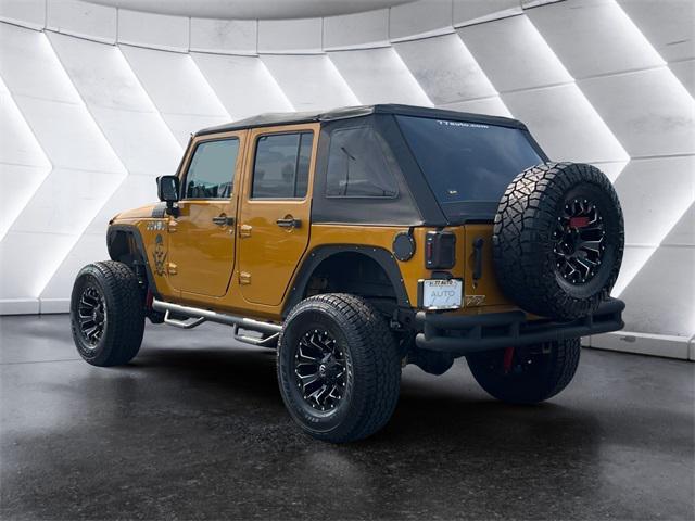 used 2014 Jeep Wrangler Unlimited car, priced at $19,977