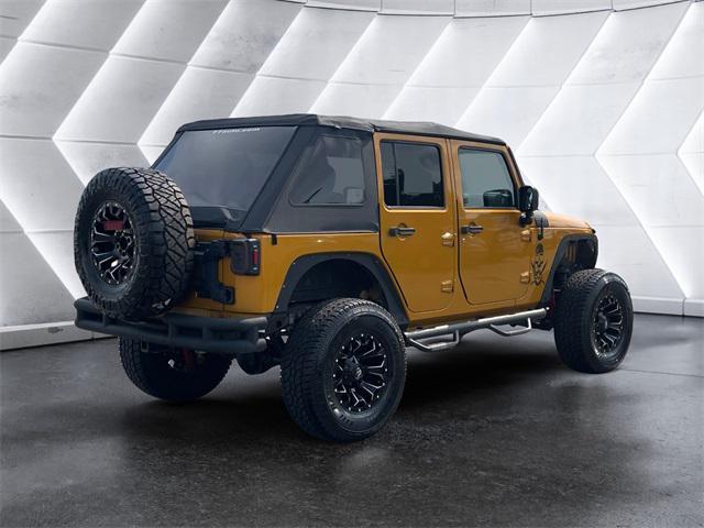 used 2014 Jeep Wrangler Unlimited car, priced at $19,977