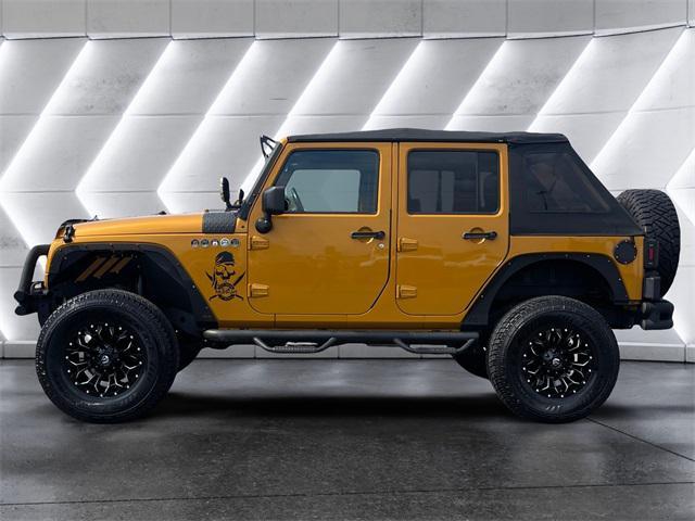 used 2014 Jeep Wrangler Unlimited car, priced at $19,977