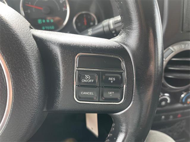 used 2014 Jeep Wrangler Unlimited car, priced at $19,977