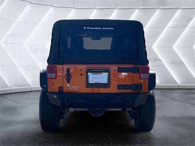 used 2011 Jeep Wrangler Unlimited car, priced at $15,477