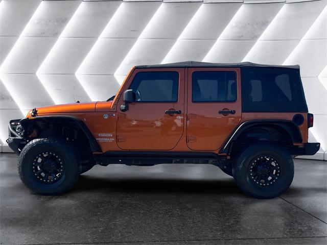 used 2011 Jeep Wrangler Unlimited car, priced at $15,477