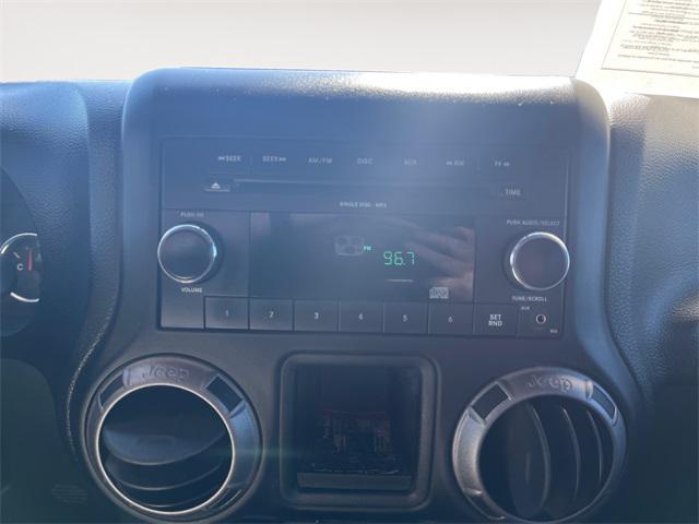 used 2011 Jeep Wrangler Unlimited car, priced at $15,477