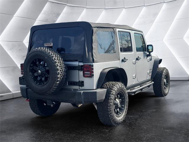 used 2014 Jeep Wrangler Unlimited car, priced at $18,977