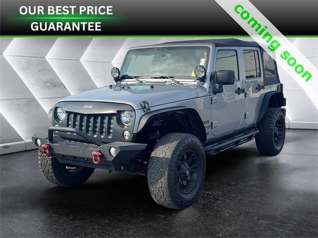 used 2014 Jeep Wrangler Unlimited car, priced at $18,977