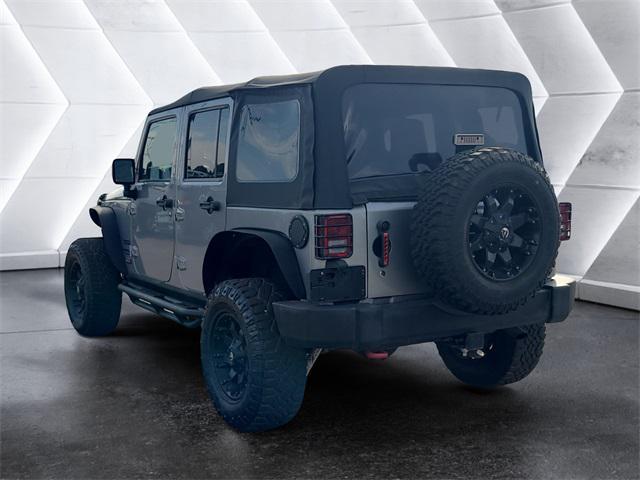 used 2014 Jeep Wrangler Unlimited car, priced at $18,977