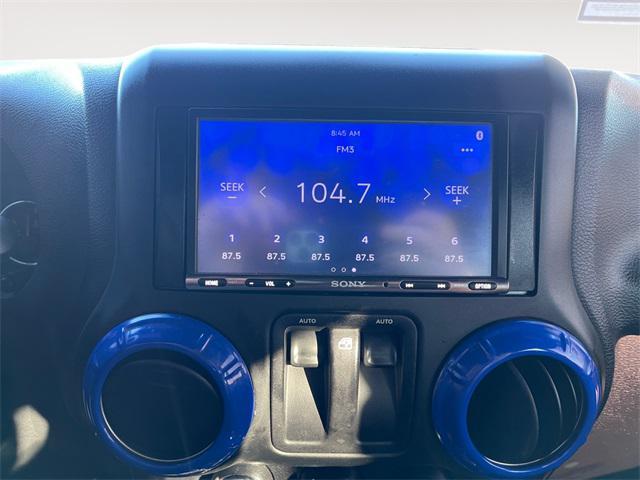 used 2015 Jeep Wrangler car, priced at $17,277